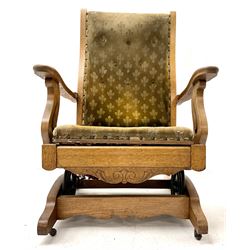 Arts and Crafts oak framed rocking chair, upholstered seat studded and buttoned