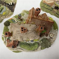 Three Lilliput lanes, comprising Oakwood Smithy, Anne of Cleves and Bluebell Farm, all with deeds and original boxes 