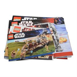 Collection of partially built Lego Star Wars models, including Motorized Walking AT-AT no. 10178, Hyena Droid Bomber no.8016, Emperor Palpatines Shuttle no. 8096, Jabbas Palace no. 4480 and Millennium Falcon no. 4504, etc together with a quantity of Lego Star Wars minifigures, loose parts and instruction booklets for Lego Star Wars sets