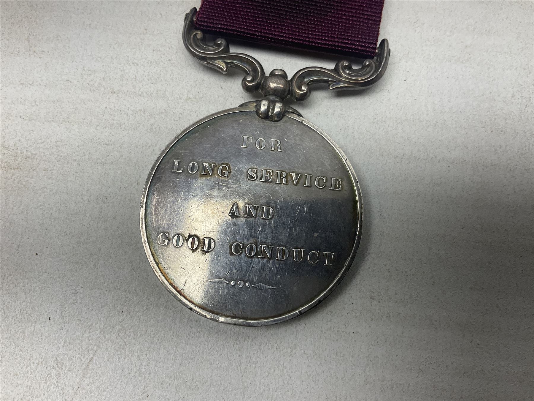 Victoria Army Long Service and Good Conduct Medal, second type reverse, awarded to 1817 Sergt. John Grant Coast R.A., with ribbon and biographical information