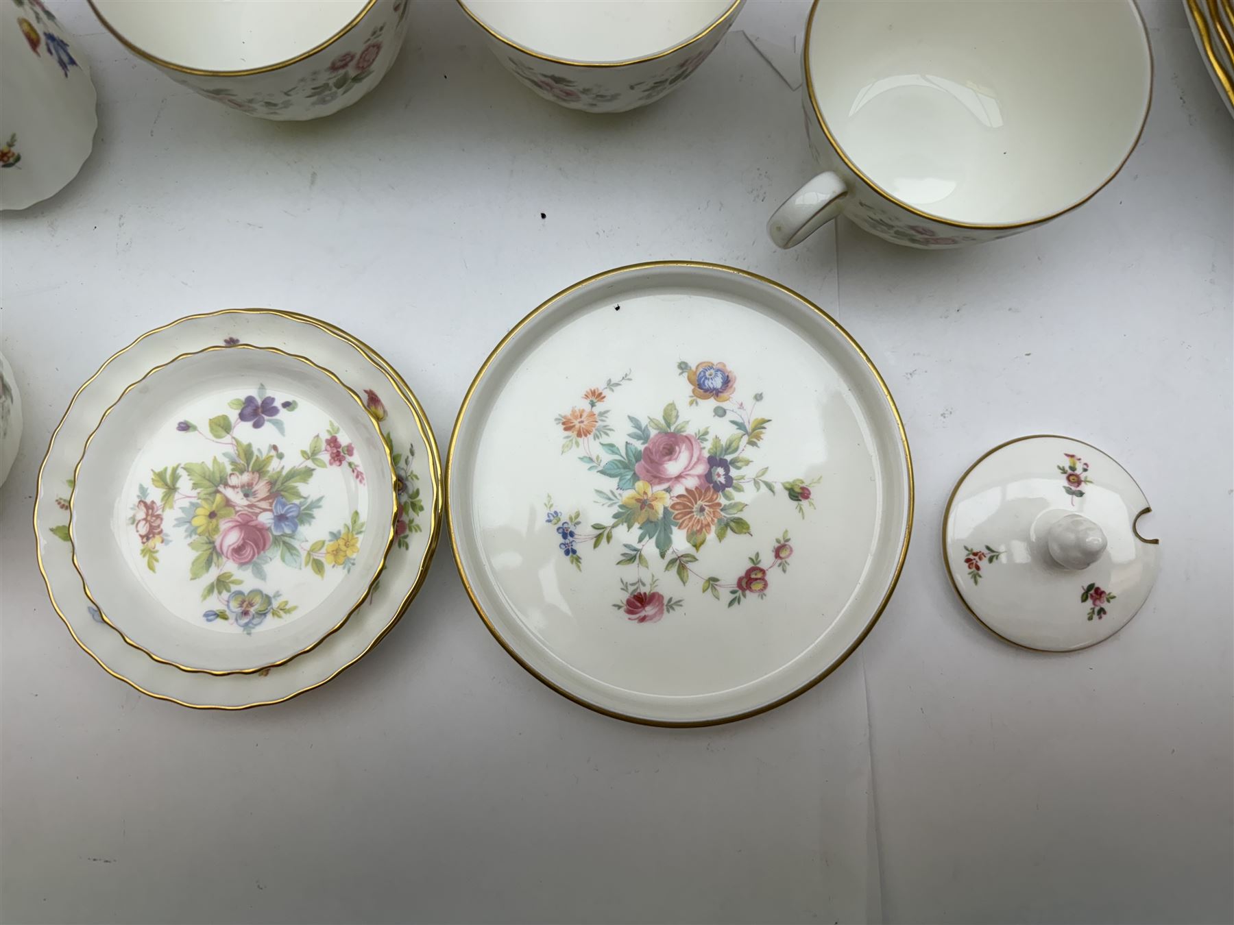 Minton Spring Bouquet pattern part tea and dinner service, including six dinner plates, six side plates, two covered dishes etc, together with Minton Marlow pattern part tea service  