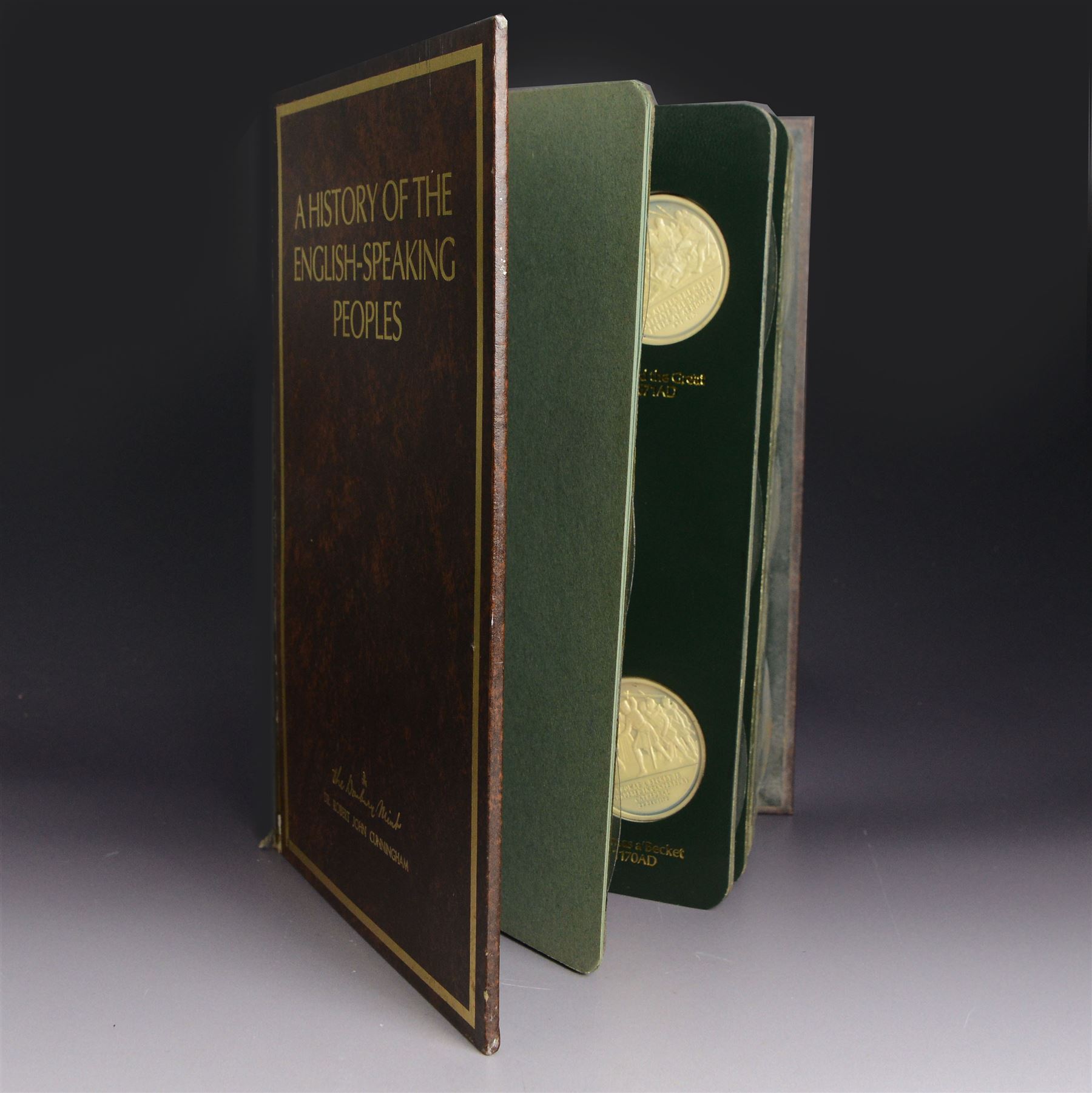 Limited Edition Danbury Mint 'History of the English Speaking Peoples' complete set of fifty silver medallions, each depicting historical figures and scenes from Julius Caesar Lands 55BC to Second World War 1939AD, contained within leatherette folder with personalised presentation to cover and interior, no. 2780/7500