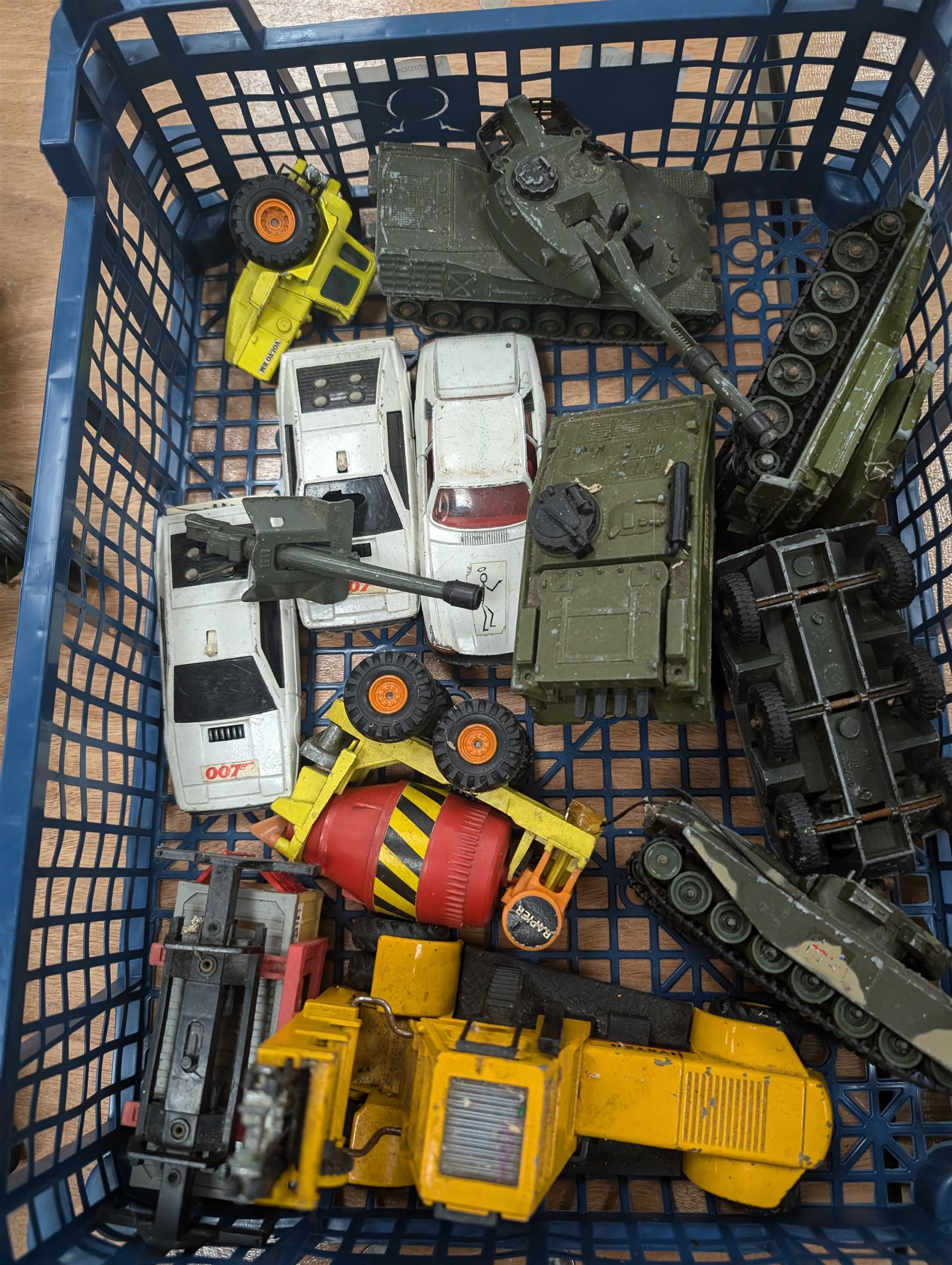 Diecast vehicles, including Britains John Deere tractor, two Corgi 007 Lotus Espirit, four Dinky tanks, etc