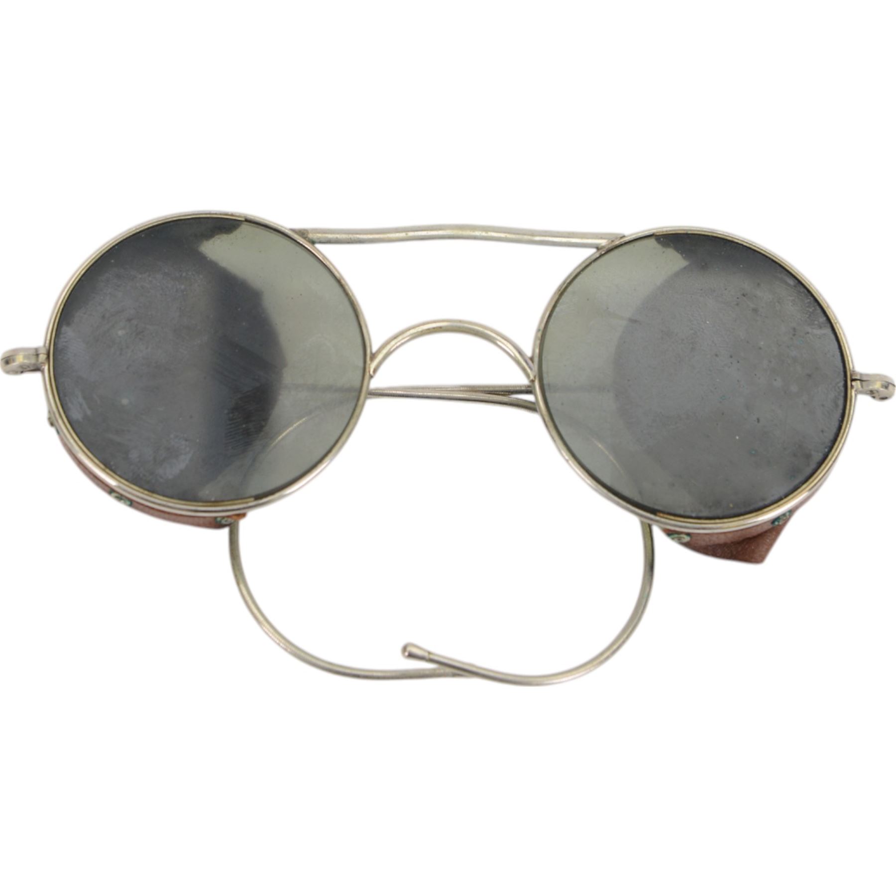 Pair of WWII British RAF Royal Air Force pilots sunglasses with leather side shields and tinted lenses, in the original Air Ministry issued tin