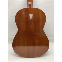 Spanish BM acoustic guitar with mahogany back and sides and spruce top L101cm; in cello carrying case; Roland foot pedal and two Yamaha foot pedals; tin D# organ pipe; folding music stand etc