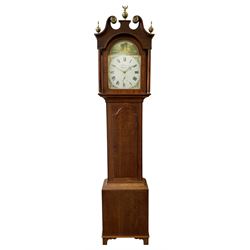 Thirty-hour oak cased longcase clock by  William Bancroft of Scarborough circa 1830, with a swan’s neck pediment, brass patera and three brass spire and ball finials, stepped break arch hood door flanked by plain pillars with brass capitals, trunk with a full length door and curved arch top, on a plain square plinth with bracket feet, painted break arch dial with roman numerals and quarter hour Arabic’s, date recorder (anti clockwise) and matching brass hands, arch painted with a rural scene depicting a ruined tower and cottage with depictions of flowers to the spandrels, dial pinned directly to a chain driven countwheel striking movement, striking the hours on a bell. With weight and pendulum. The Bancroft family were prodigious Scarborough clockmakers during the 18th and 19th century, William Bancroft is recorded as working in Newborough Street from 1820 onwards. 


