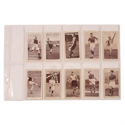 Forty Churchman's and Ogden's football cigarette cards, including twenty-two Association Footballers' and seven 'Football Club Colours' examples
