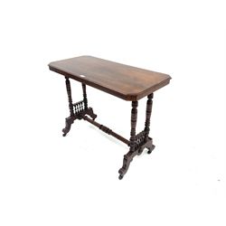 Edwardian mahogany side table, turned supports and stretcher, shaped legs and castors 