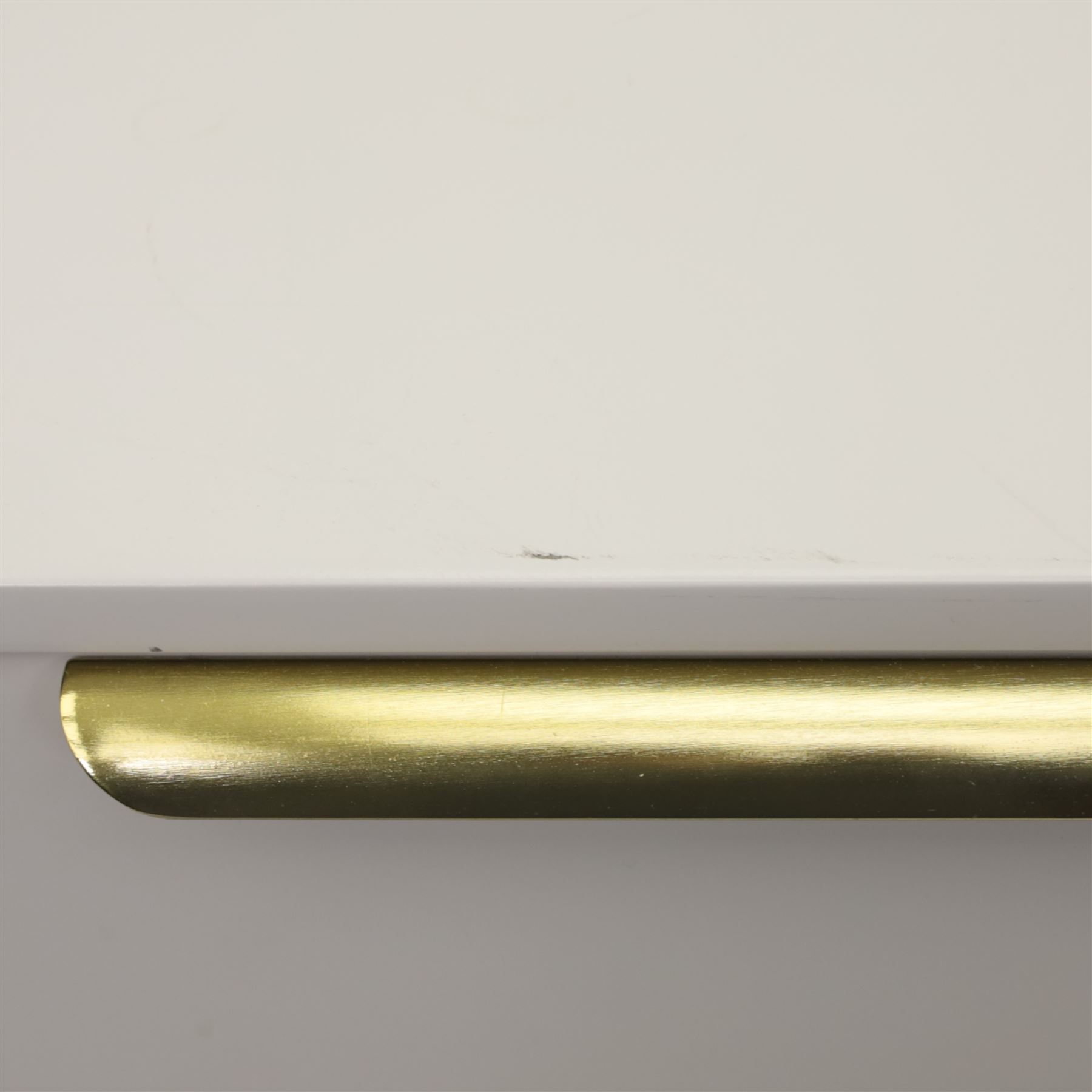 Made.com - 'Ebro' grey four drawer chest, gold painted metal shaped handles, rounded corners with fluted detail, raised on gold painted metal tapered supports