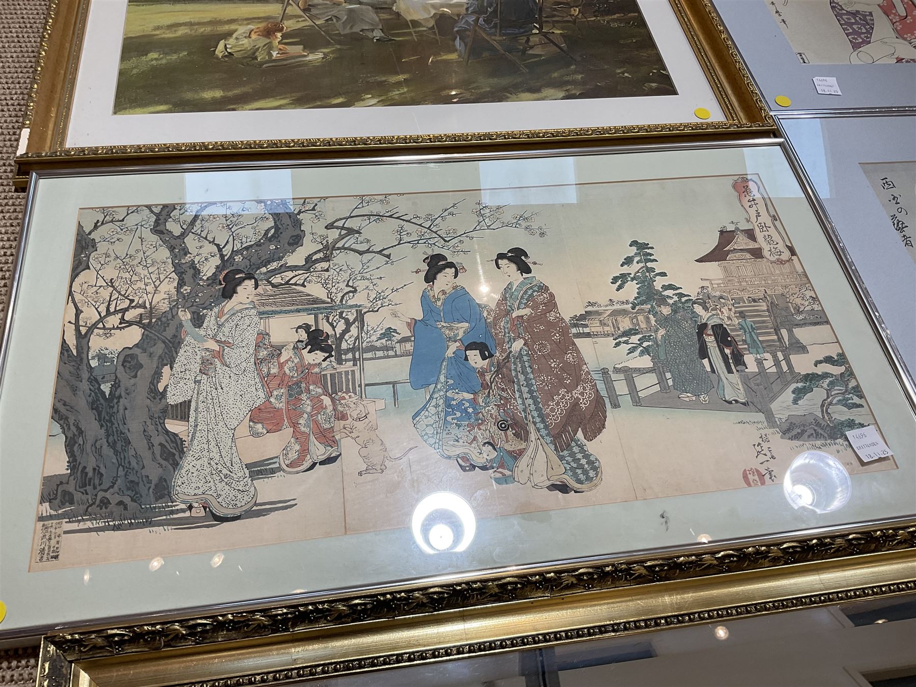 Yosai (Watanabe) Nobukazu (Japan 1872-1944): ‘The Sleeping Dragon Plum Tree At Kameido’, triptych woodblock print, together with four reproduction Japanese prints, another print, and a mirror (7)