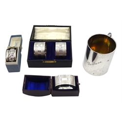 Silver christening cup by Joseph Gloster Ltd, Birmingham 1933, two silver napkin rings by the same hand, two others by Deakin & Francis Ltd and Constantine & Floyd Ltd, all cased, approx 7oz