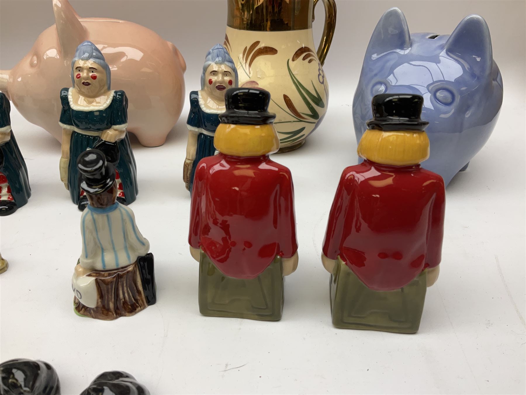 Collection of Wade ceramics, to include limited edition figure Auld Lang Syne, Amelia Bear, Chuckles The Clown, Emily The Doll, Peter Pan collection John etc