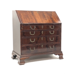  George lll mahogany bureau, figured fall front with fitted interior, the four long graduated cockbeaded drawers with C scroll cast Rococo brass handles, on ogee bracket feet, W96cm, D55cm, H106cm  
