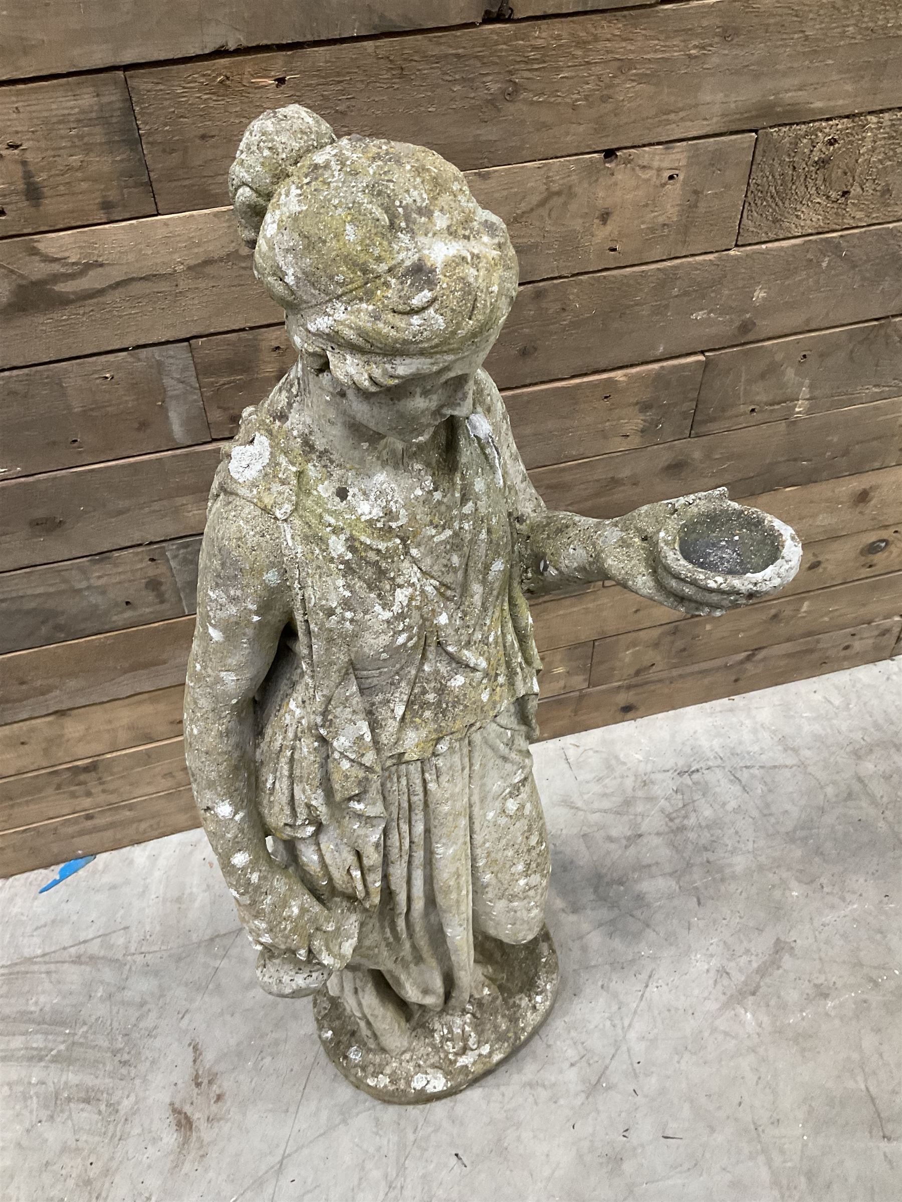 Pair of cast stone garden dogs and 2 female figures,