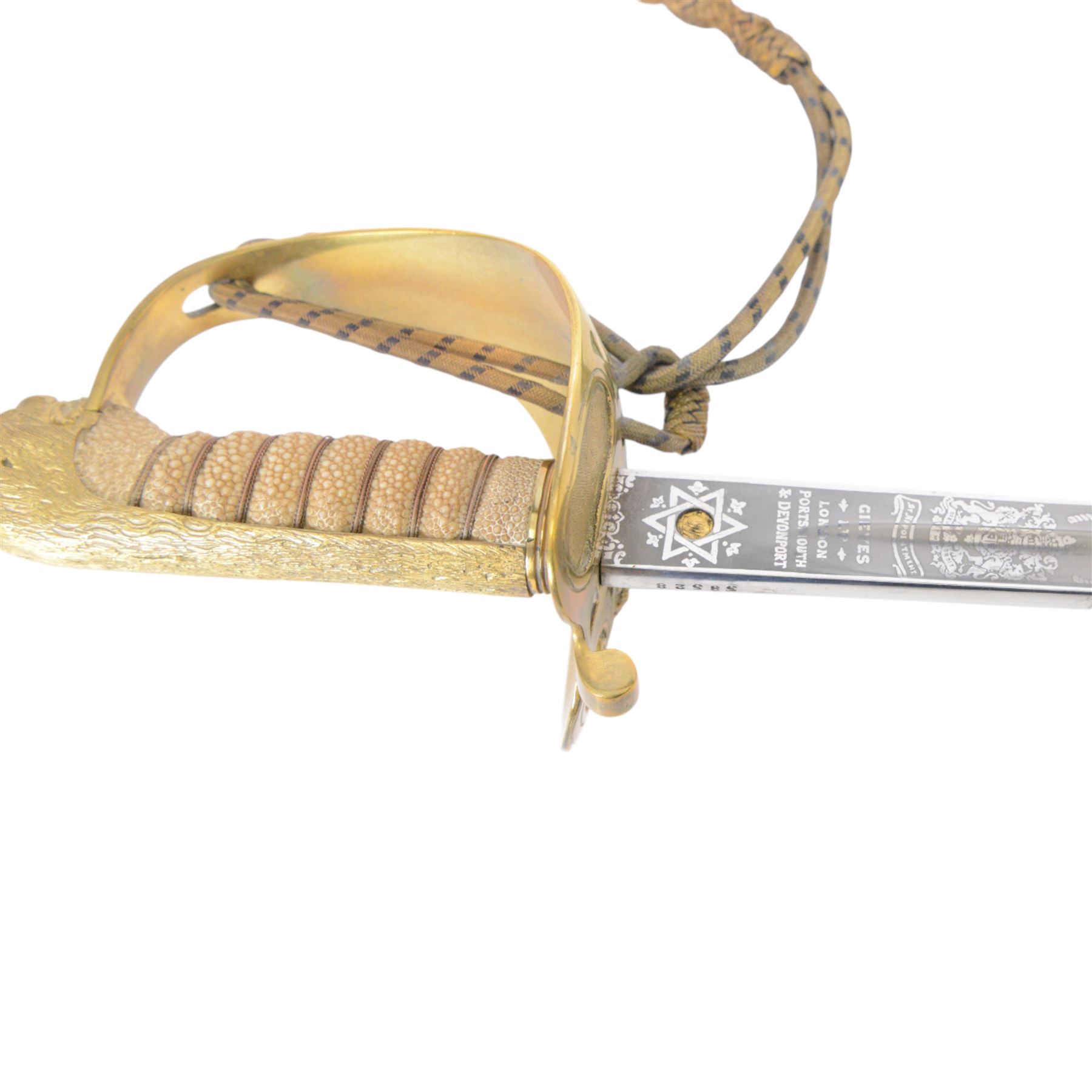 British 1827 pattern Naval officer's sword, named, by Wilkinson Sword Company in 1920 for P.H. Earle and retailed by Gives, the 80cm slightly curved blade etched to both sides, the brass guard held into scabbard by patent spring clip, lion head pommel and backstrap, with sword knot, within leather scabbard with three brass mounts, twin suspension rings and attached belt and suspension straps with gilt buckle and braid, overall L98cm 