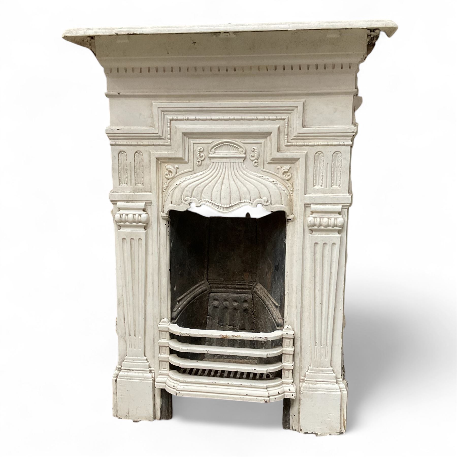 Two Victorian small cast iron fireplaces in a white finish