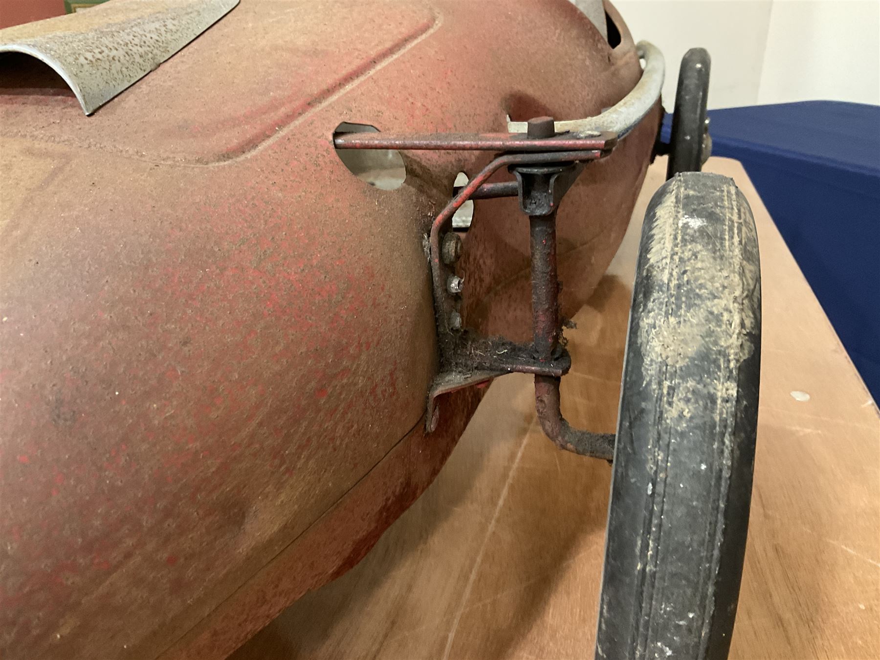 Tri-ang pressed steel Grand Prix Vanwall child’s pedal racing car, English 1960s, finished in red with racing No.3, original white plastic steering wheel, metal bucket seat, bonnet air intake, chrome plated side exhaust, chrome spoked wheels with chrome plated spinners, black solid rubber tyres L121cm W53cm H46cm)