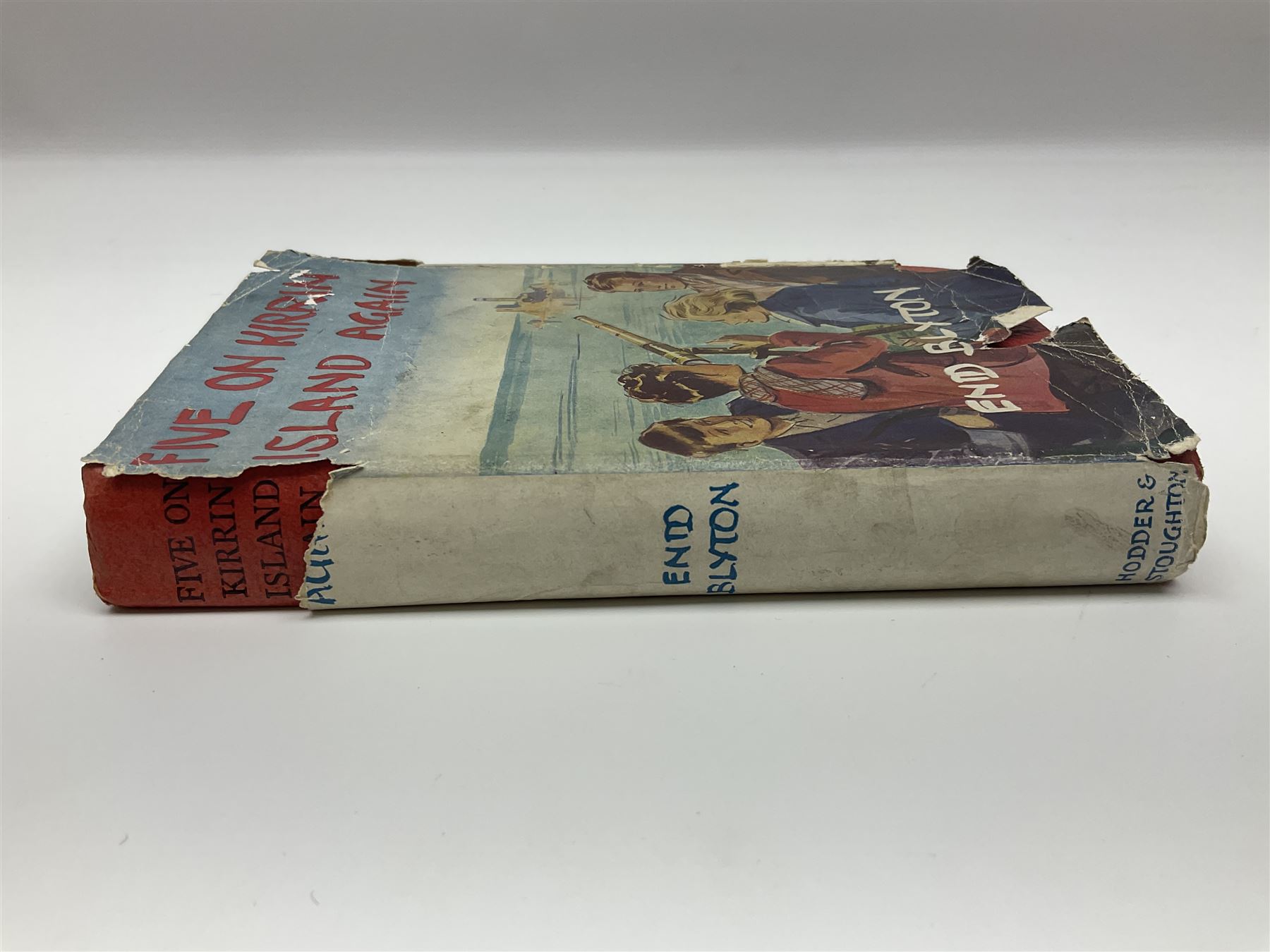 Blyton Enid: Five on Kirrin Island Again, first edition, Hodder & Stoughton, 1947, colour frontispiece, tinted plates and plain illustrations to text, pictorial endpapers, original red boards lettered in black in dust jacket (6/-, with telescope the wrong way round)