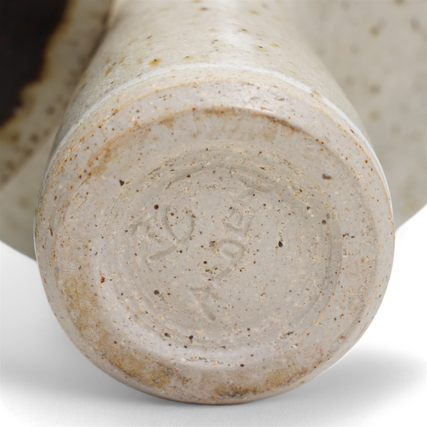 Barbara Cass (1921-1992) for Arden pottery; two studio pottery stoneware vases of slender tapering form with exaggerated flared rims, one with sunburst decoration, in cream and brown glazes, impressed marks to bases, tallest H18.5cm (2)