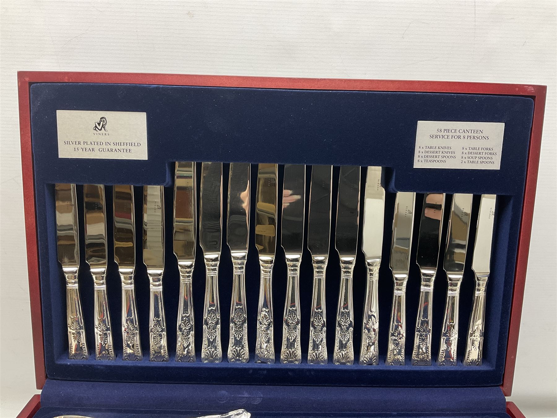 Viners Emassy canteen of Sheffield silver plated cutlery, 58 pieces, comprising eight table knives, dessert knives, dessert spoons, teaspoons, table forks, dessert forks, soup spoons, and two table spoons, housed in case with hinged lift up lid raised on four feet, L45cm