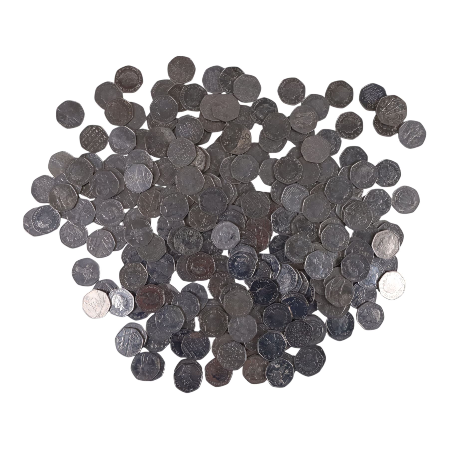 Queen Elizabeth II commemorative fifty pence coins, including London 2012 and Beatrix Potter examples, face value of approximately 122 GBP