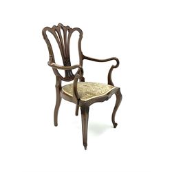 Early 20th century carved walnut framed open armchair, shaped and carved splat, scrolling arms, raised on cabriole supports 