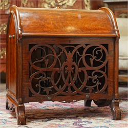 Victorian rosewood enclosed music Canterbury, the domed hinged cover enclosing a three-div...
