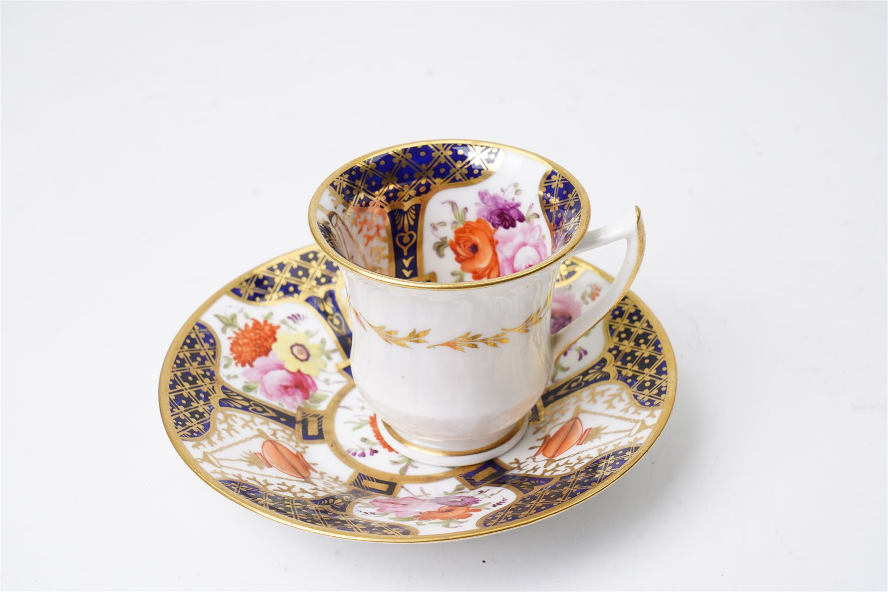 Grainger Lee & Co Worcester teacup, together with a collection of cobalt blue cabinet cups and saucers,  including a Royal Doulton hand-painted example by E Percy, and various others 19th century and later, mostly unmarked (7 pairs)