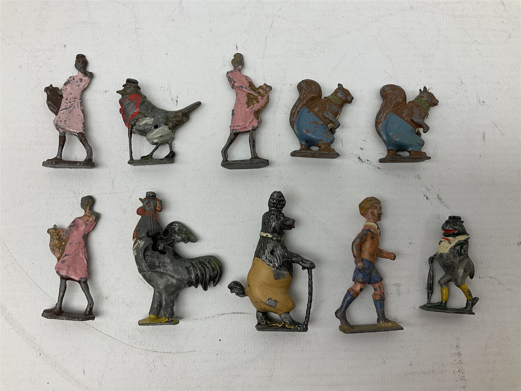 Collection of twenty-two Britains Cadbury's Cococubs play worn lead painted figures to include Mr Pie Porker, Mrs Pie Porker, Tiny Tusks, Captain Kangaroo, Granny Owl and others, Britains Snow White and Doc lead figures and other painted lead figures (30)