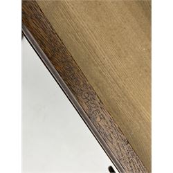 Arts and Crafts period oak mirror back dresser, projecting cornice above rectangular bevelled mirror and shelf, two turned supports, inset copper panel with embossed decoration, rectangular moulded top over two drawers and two panelled cupboard, moulded plinth base, brass and copper strappings and handles 