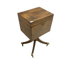 Regency mahogany cellarette on stand, rectangular top with hinged lid, raised on turned pedestal terminating in quadrupod base with brass cups and castors