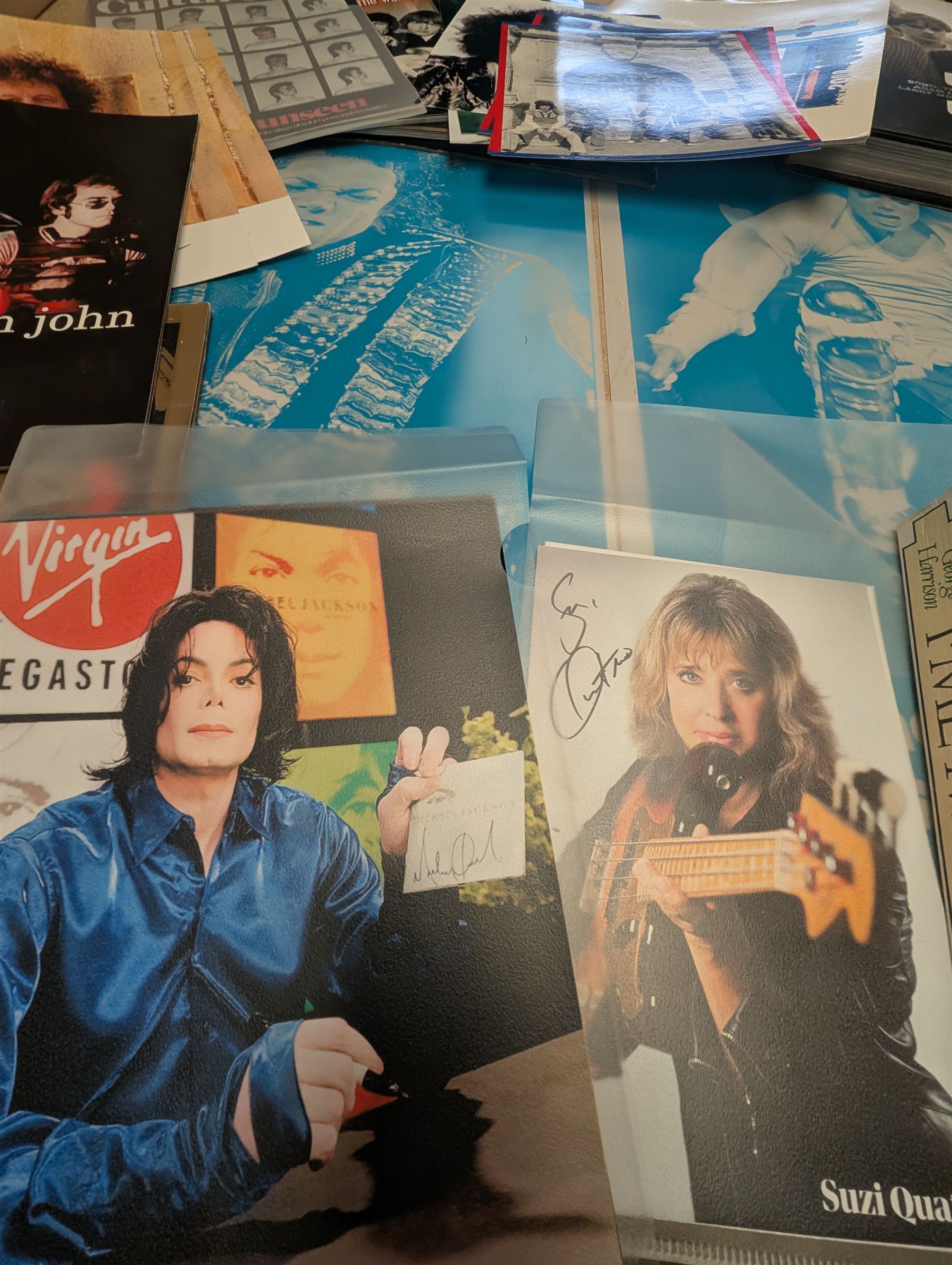 Music memorabilia, comprising signed photographs, including Leo Sayer and Suzie Quattro,  tour programmes, including Rod Stewart and Tina Turner, U2 book, two metal Michael Jackson posters and photographs 