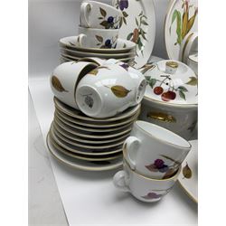 Royal Worcester Evesham pattern tea and dinner wares, to include, three covered tureens of various sizes, coffee pot, two lidded pots, tea cups and saucers of various sizes, two egg cups, round serving platter, five dinner plates, large jug, pair of napkin rings, salt and pepper etc (72)