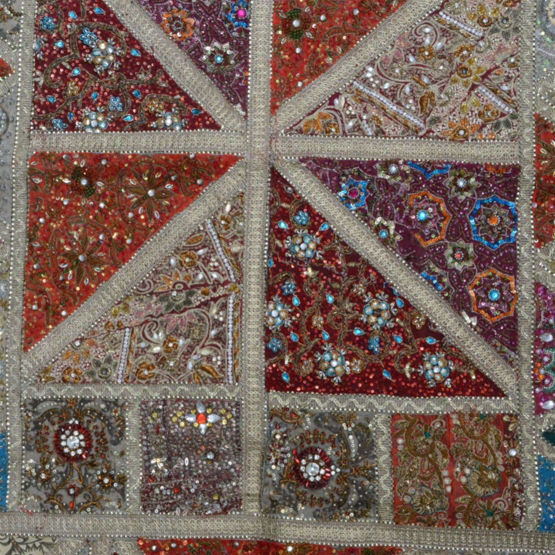 20th century Zardozi wall hanging, hand embroidered in gold thread and beadwork, in geometric platters H90cm, L142