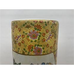 Modern Japanese ceramic umbrella stand, decorated with a figural panel on a yellow floral ground, H60cm