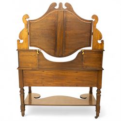 Late Victorian burr walnut veneer dressing table, the arched swing mirror surmounted by pierced scroll cresting, flanked by twin drawers on turned columns, over moulded rectangular top with five drawer arrangement, on block supports with shaped undertier