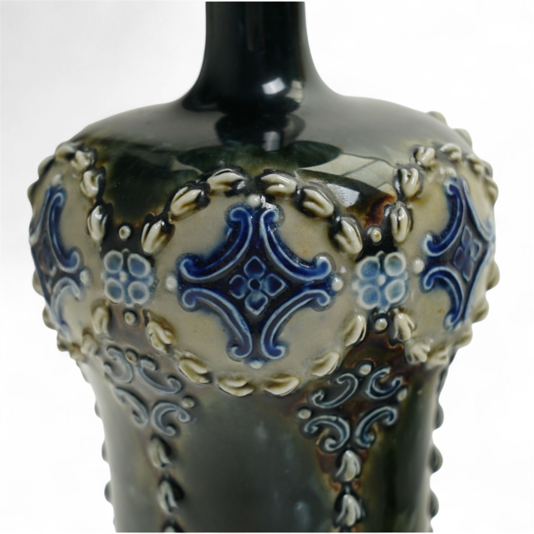 Pair of Royal Doulton stoneware vases, of baluster form with bulbous neck, with trailing white flowers and blue panel decoration, impressed mark and signature to base, 26cm (2)