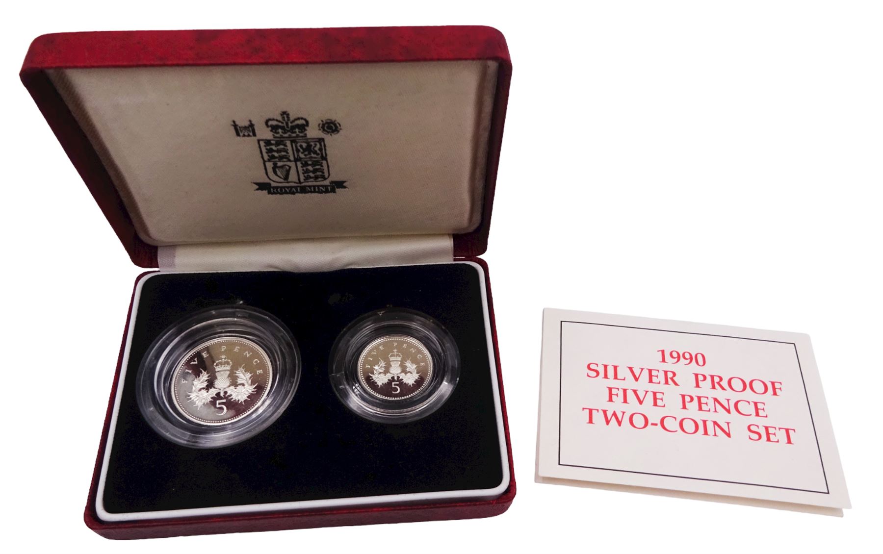 The Royal Mint United Kingdom silver proof coins, comprising 1990 five pence two-coin set, 1998 'His Royal Highness The Prince of Wales Fiftieth Birthday' crown, and 1998 'NHS 1948 -1998' fifty pence coin, all cased with certificates