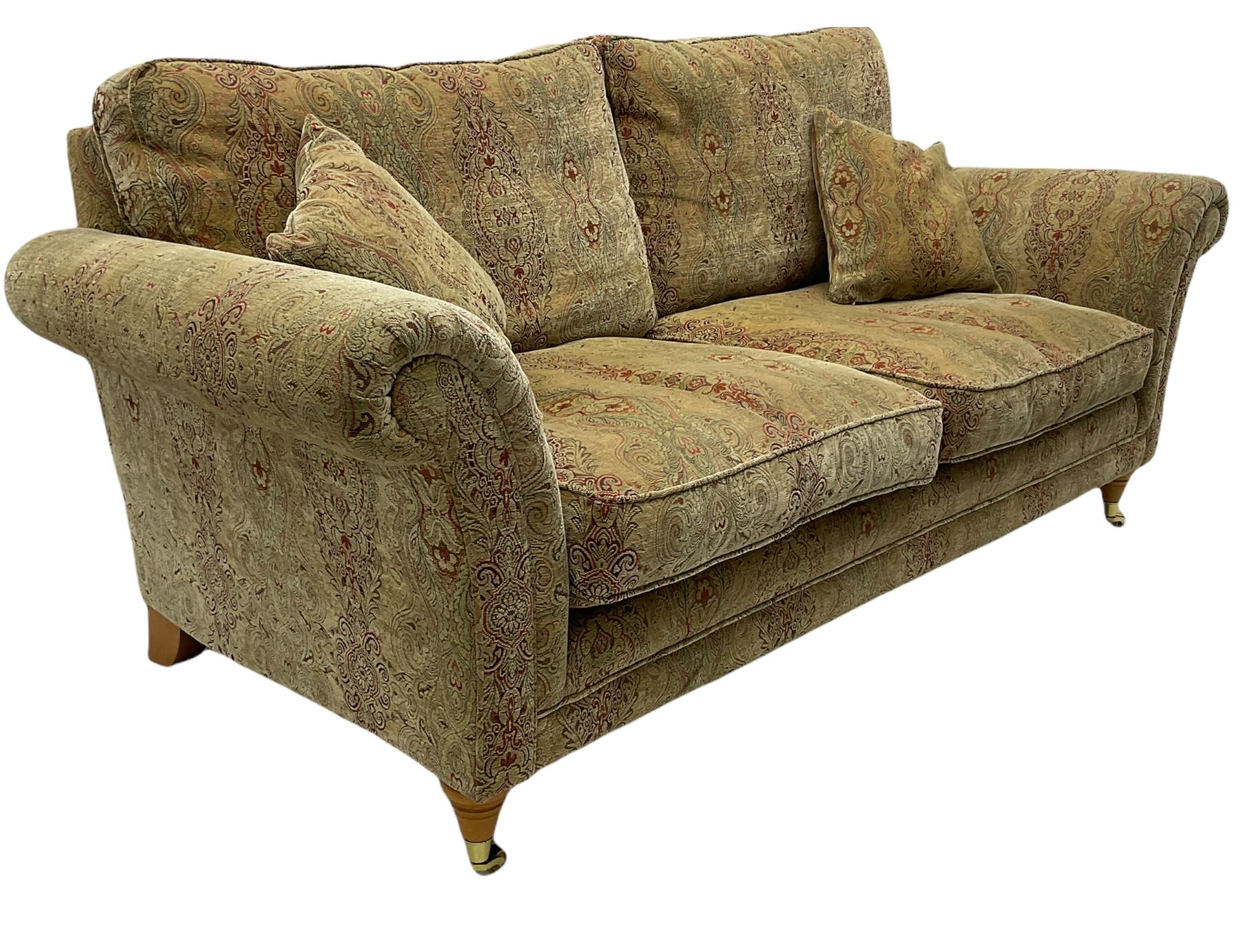 Parker Knoll two seat sofa, upholstered in natural beige patterned fabric