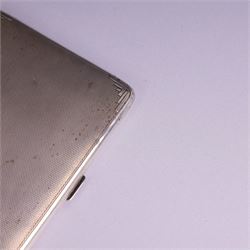 1930s silver cigarette case, of rectangular form with rounded corners, with engine turned decoration throughout, with personal engraving to interior, hallmarked Padgett & Braham Ltd, London 1931, L 11cm 