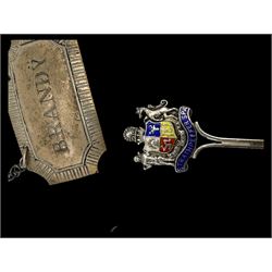 Three silver decanter labels and a collection of silver and silver plated cutlery