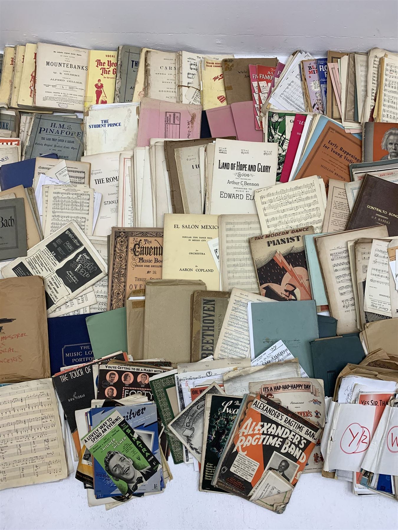 Steinway & Sons - late 19th century figured walnut upright piano, iron framed and overstrung, model no. 56174 circa. 1886, W154cm, H137cm, D70cm, together with a quantity of sheet music