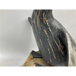 Wooden sculpture of Cormorant aquatic bird on a naturalistic wooden plinth, H46cm
