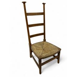 Attributed to William Birch of High Wycombe - Arts & Crafts oak ladder-back side chair, with turned finials, rush seat, and stretchers, raised on square-section supports; 19th century mahogany Pembroke table, rectangular drop-leaf top raised on turned supports with central stretcher and splayed feet
