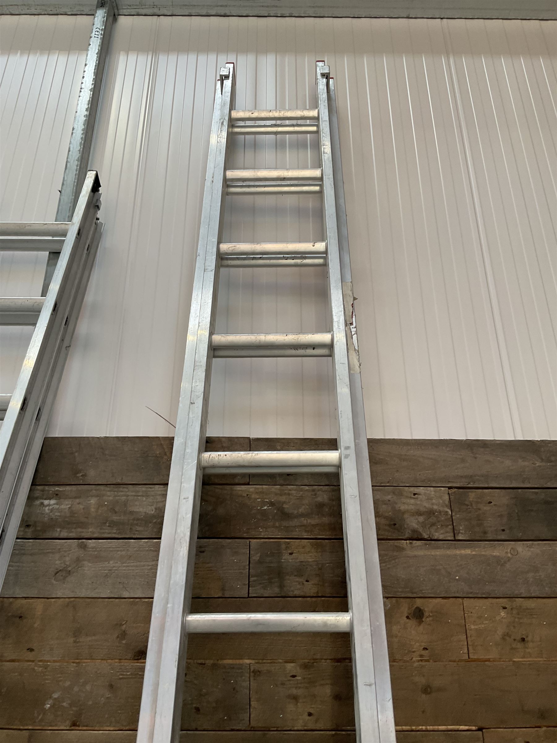 Abru pair of aluminium extendin ladders, 3.4m - 6.1m