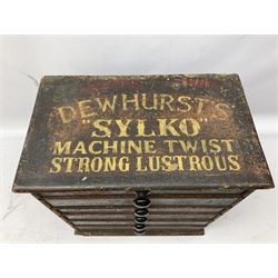 Early 20th Century Dewhurst table top chest, decorated with gilded 'Dewhurst's Sylko Machine Twist Strong Lustrous' lettering above six long drawers with names and numbers of cotton also detailed in gilt, H39cm
