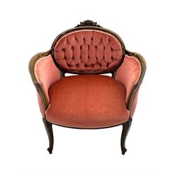 Edwardian inlaid rosewood parlour suite, comprising pair of tub shaped armchairs (W77cm, D69cm, H88cm); and matching two-seat sofa (W112cm, D69cm, H88cm), each with carved crest rails with shell motifs, deep button-tufted oval backs upholstered in pink fabric with braid trim, on cabriole supports