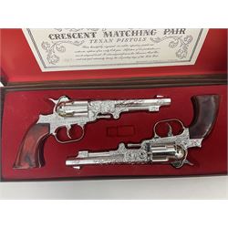 Crescent, Cap Guns - boxed 'Crescent Matching Pair' of 'Texan Pistols' toy cap guns; containing two ''Rustler Texan' ornately decorated pistols finished in silver / plated effect with brown marbled moulded grips; and Japanese Gakken Electronic Project Kit; boxed with wooden base and instruction booklet (2)