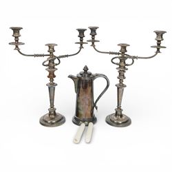 Pair of silver plated three branch candelabra, each with three urn-shaped sconces, with sc...