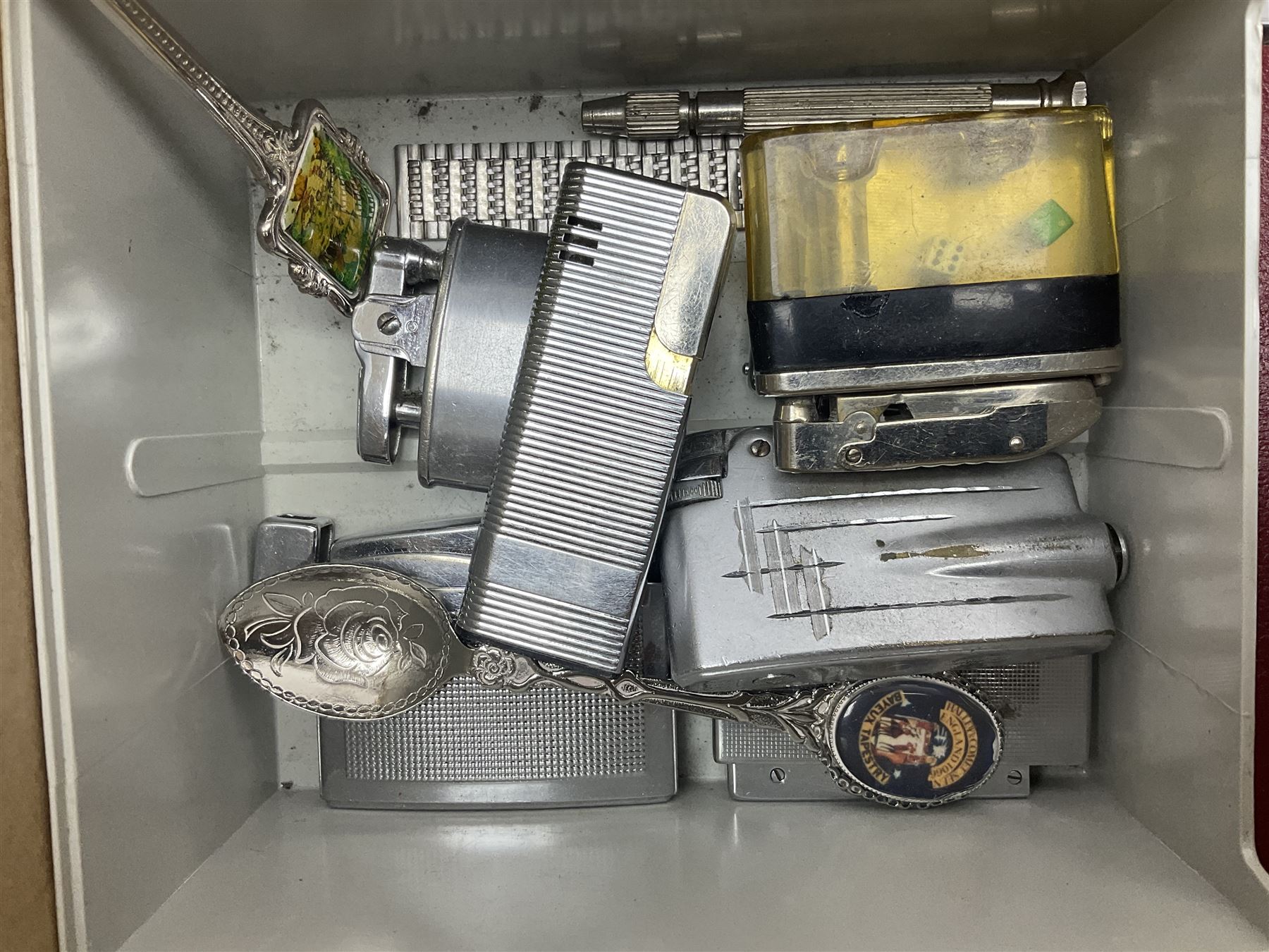 Collection of souvenir spoons, together with lighters and other collectables 